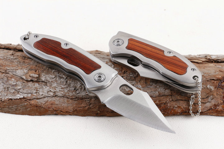 Browning F113 folding knife with wood and steel handle UD405196